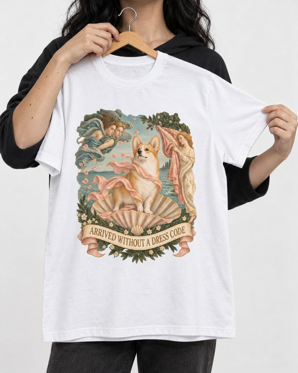 Corgi Arrived Without a Dress Code Birth of Venus T-Shirt in White, held up on a hanger