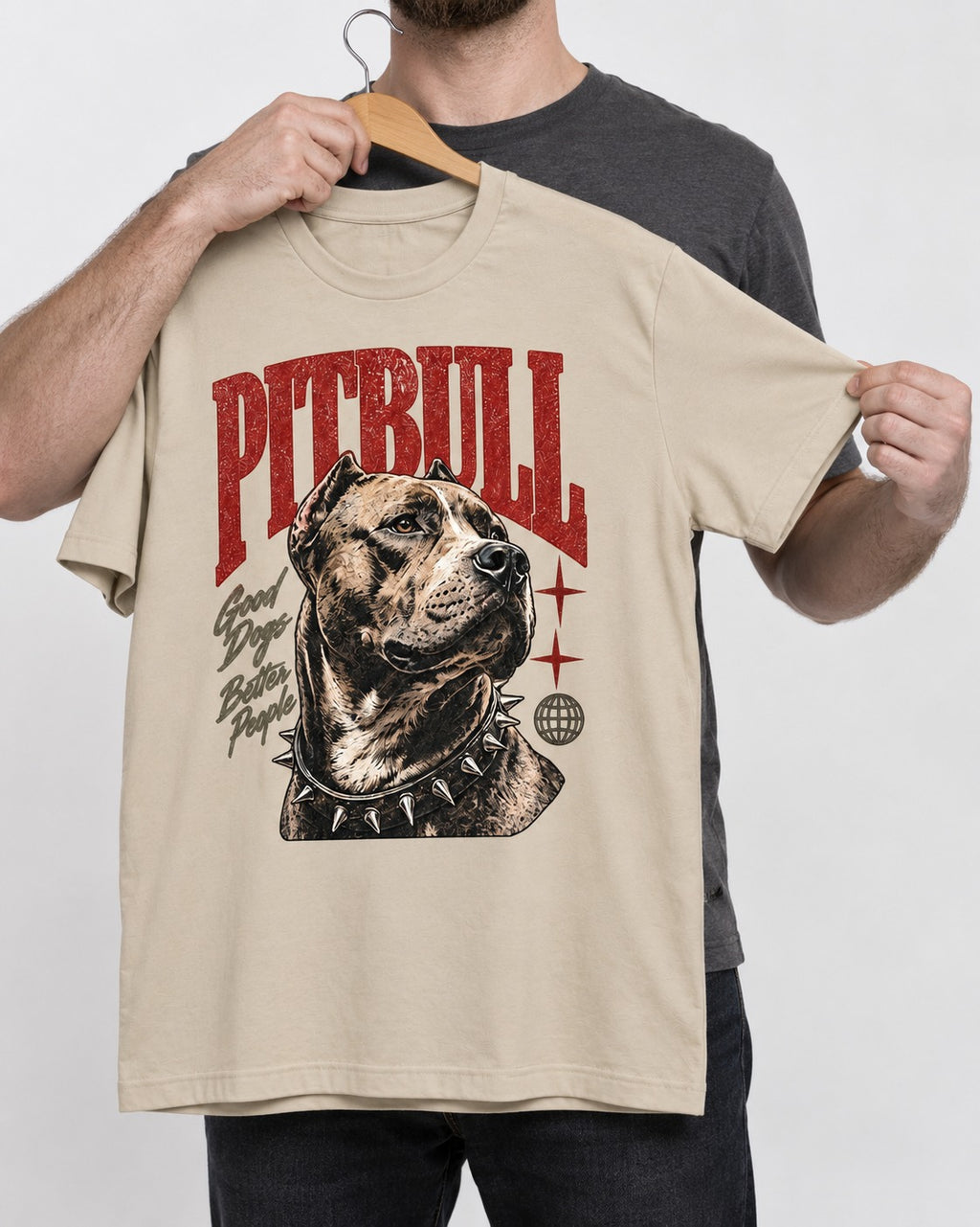 Pitbull Makes Better People T-Shirt in Sand, held up on a hanger