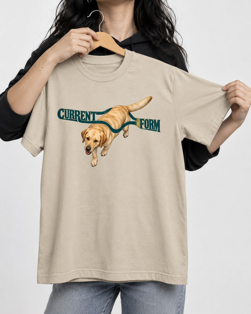 Labrador Retriever Current Form T-Shirt in Sand, held up on a hanger