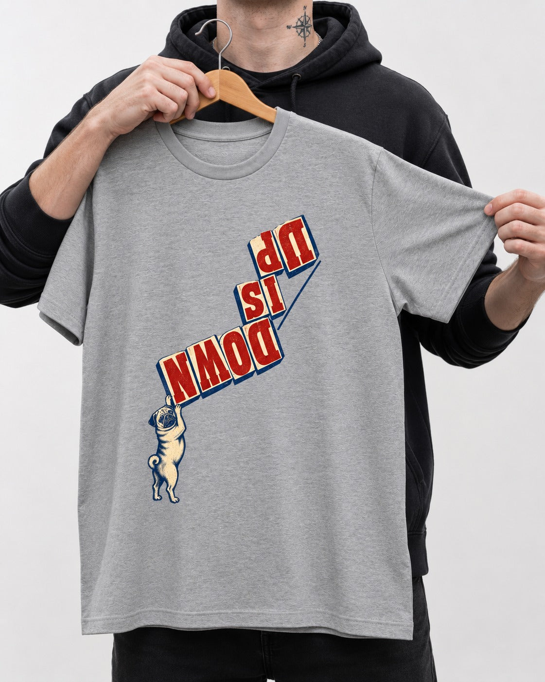 Down Is Up Pug T-Shirt in Sport Grey, held up on a hanger