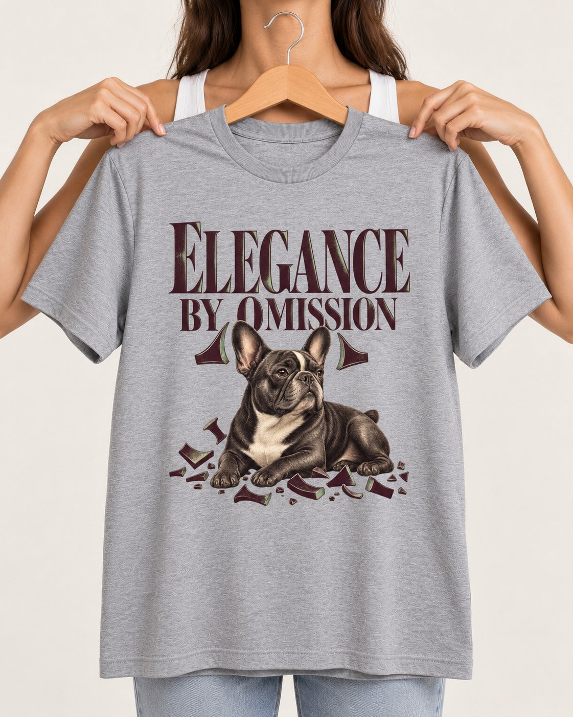 Frenchie Elegance by Omission T-Shirt in Sport Grey, held up on a hanger