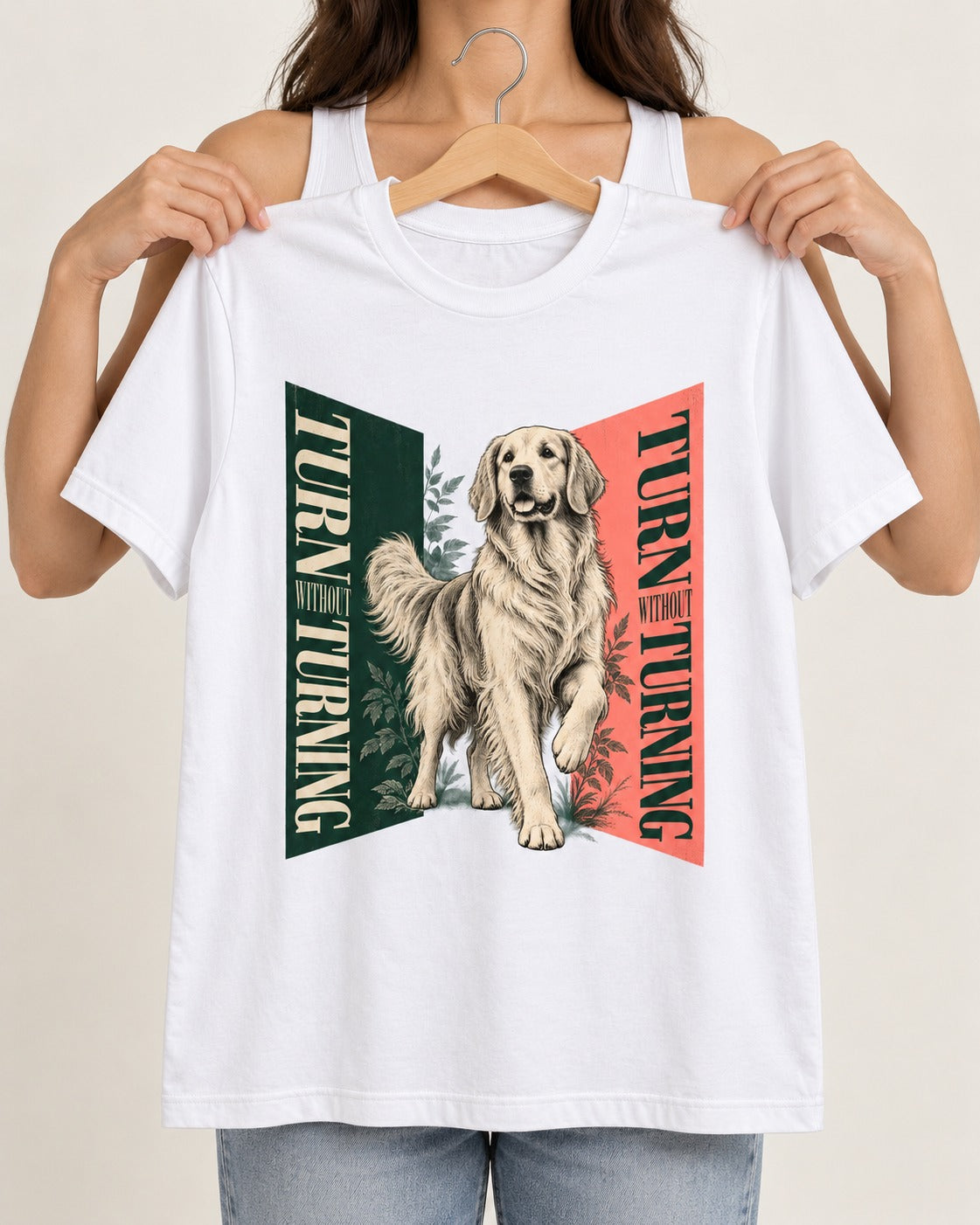 Golden Retriever Turn Without Turning Gateway Graphic T-Shirt in White, held up on a hanger