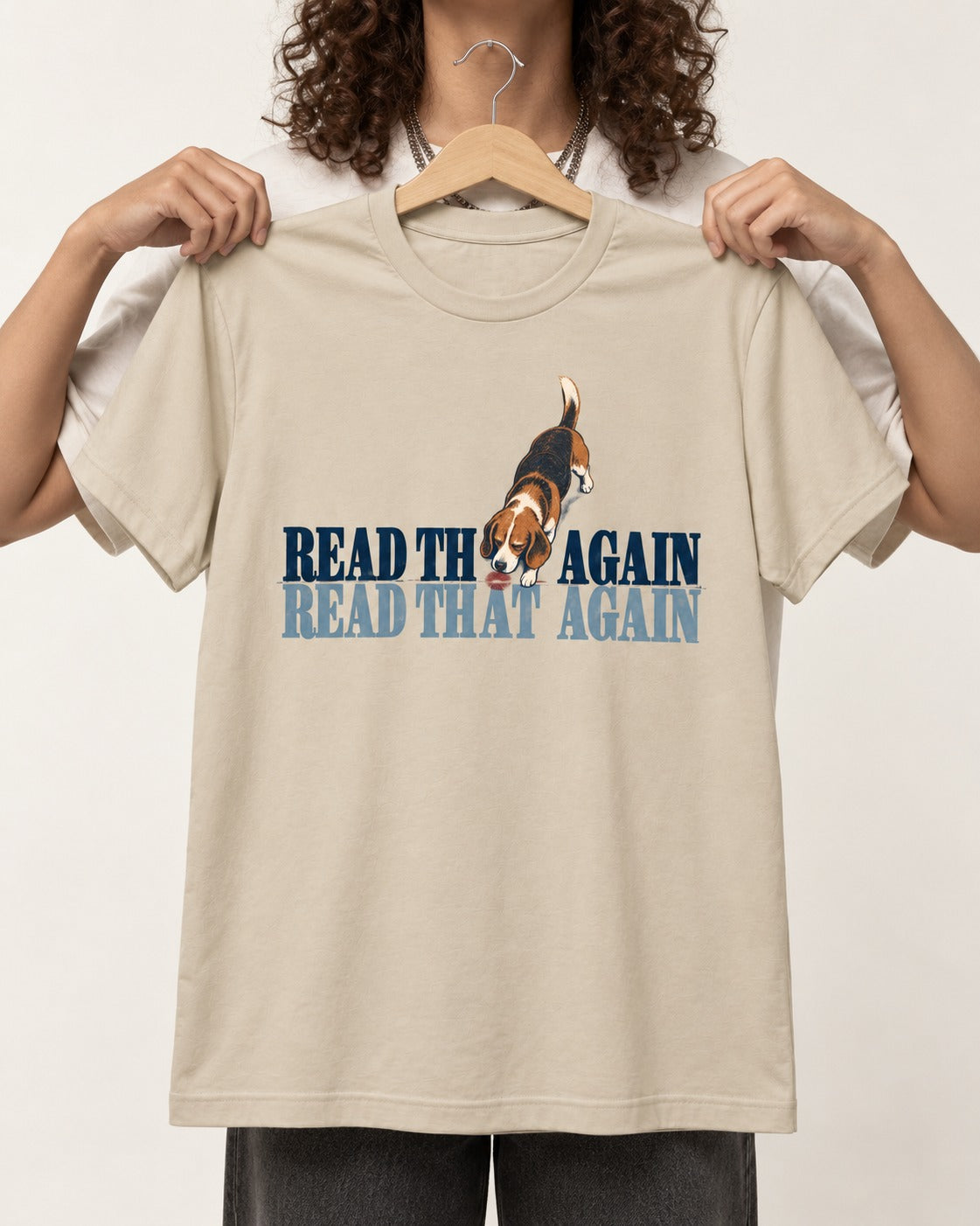 Read That Again Beagle T-Shirt in Sand, held up on a hanger