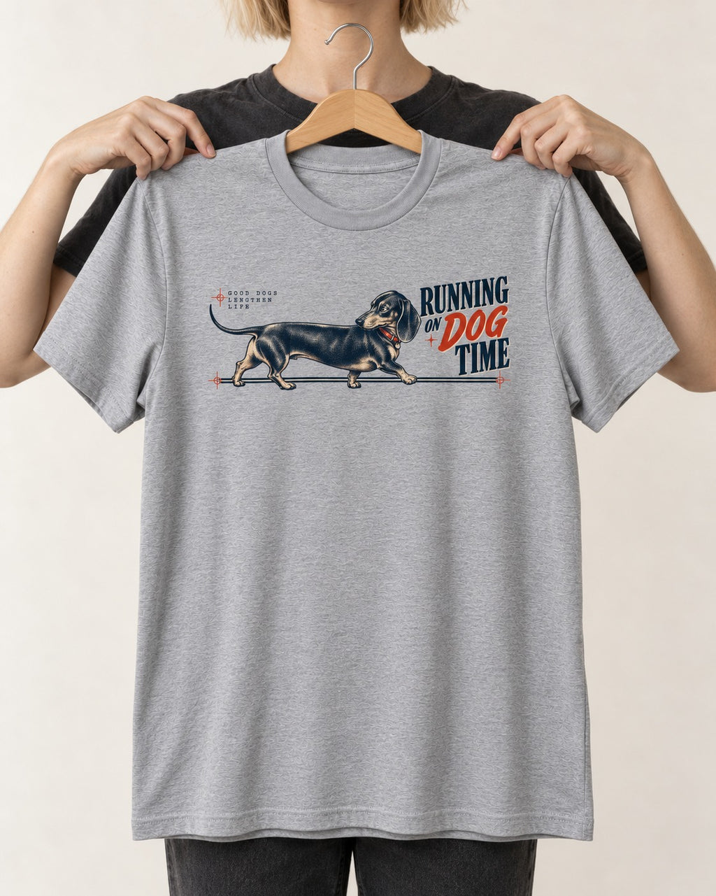 Dachshund Lengthens Life T-Shirt in Sport Grey, held up on a hanger