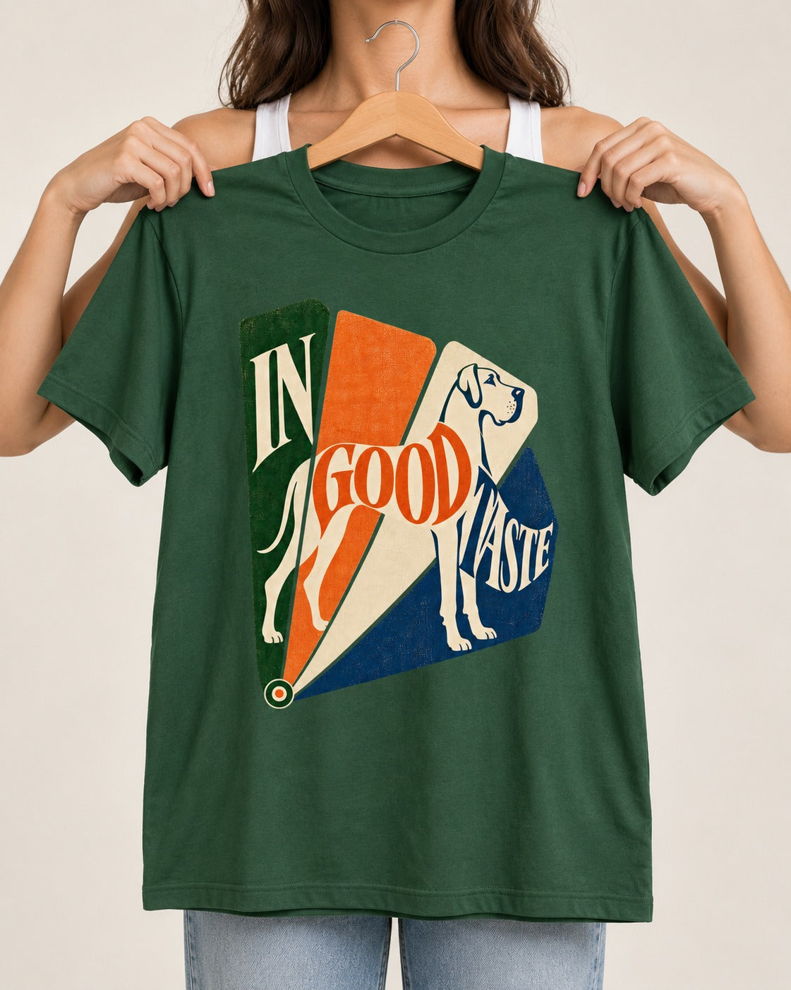 Great Dane In Good Taste Color Fan Graphic T-Shirt in Forest Green, held up on a hanger