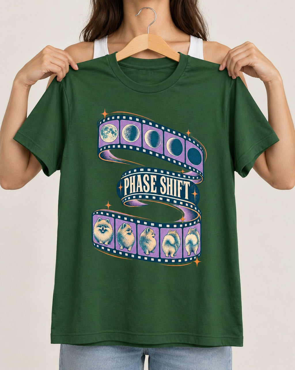 Pomeranian Phase Shift Filmstrip Graphic T-Shirt in Forest Green, held up on a hanger