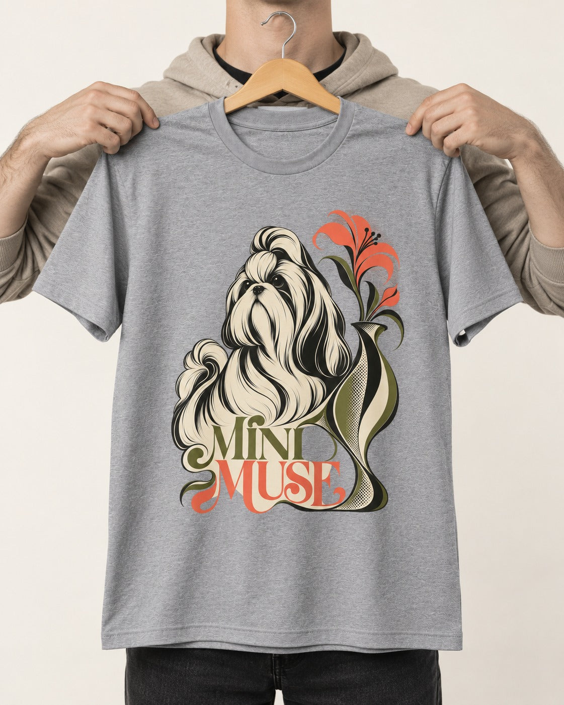 Shih Tzu Mini Muse T-Shirt in Sport Grey, held up on a hanger