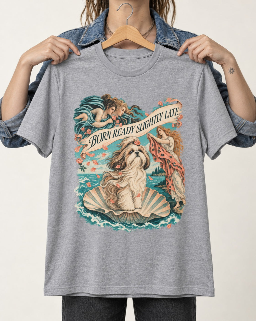Shih Tzu Born Ready Slightly Late Venus Graphic T-Shirt in Sport Grey, held up on a hanger