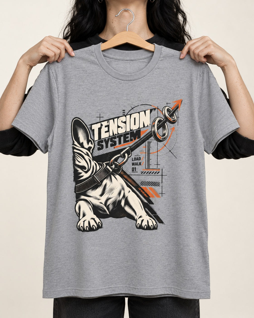 Frenchie Tension System T-Shirt in Sport Grey, held up on a hanger