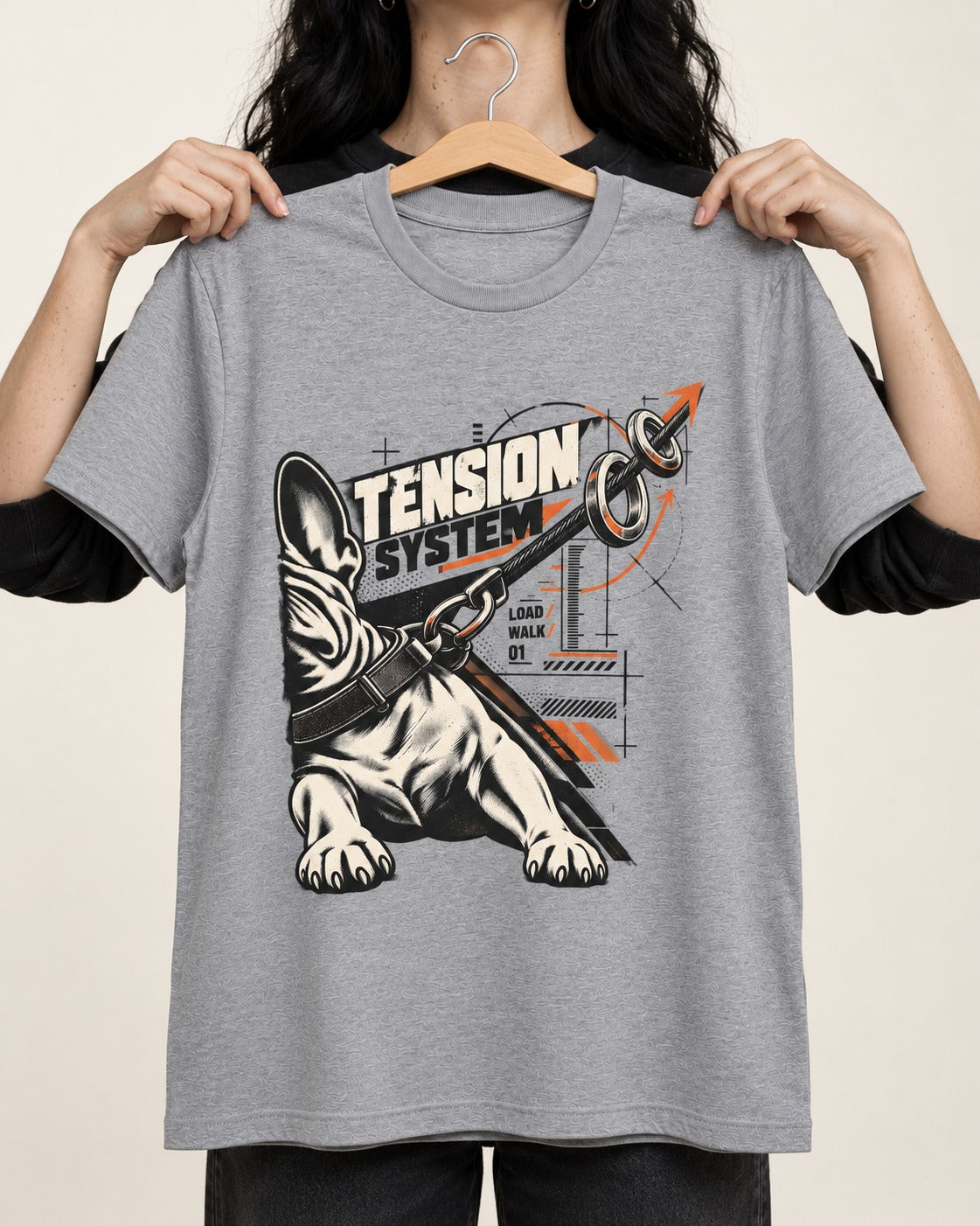 Frenchie Tension System T-Shirt in Sport Grey, held up on a hanger