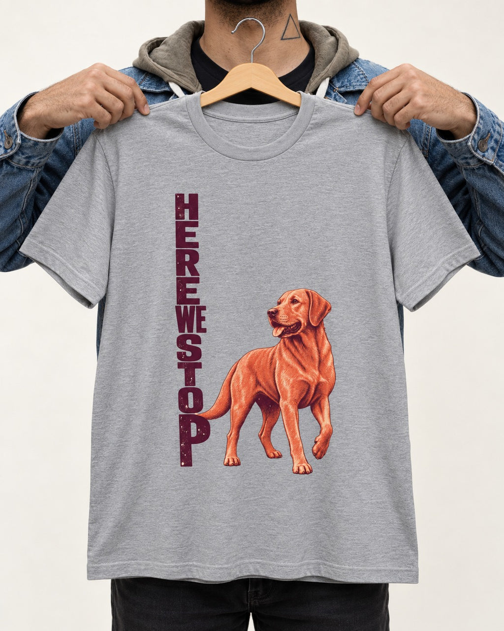 Here We Stop Labrador Retriever T-Shirt in Sport Grey, held up on a hanger