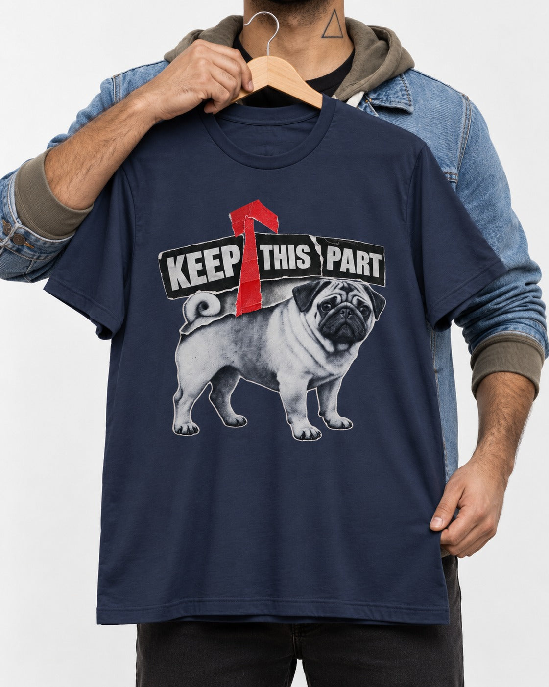 Pug Keep This Part Tape Arrow Graphic T-Shirt in Navy, held up on a hanger