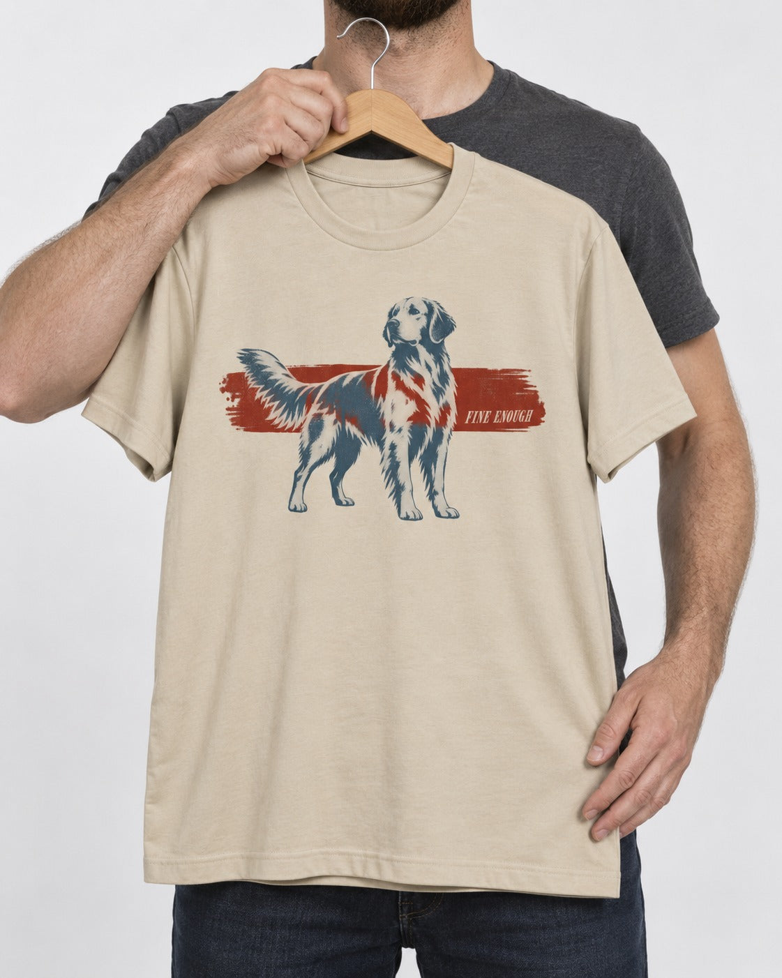 Fine Enough Golden Retriever T-Shirt in Sand, held up on a hanger