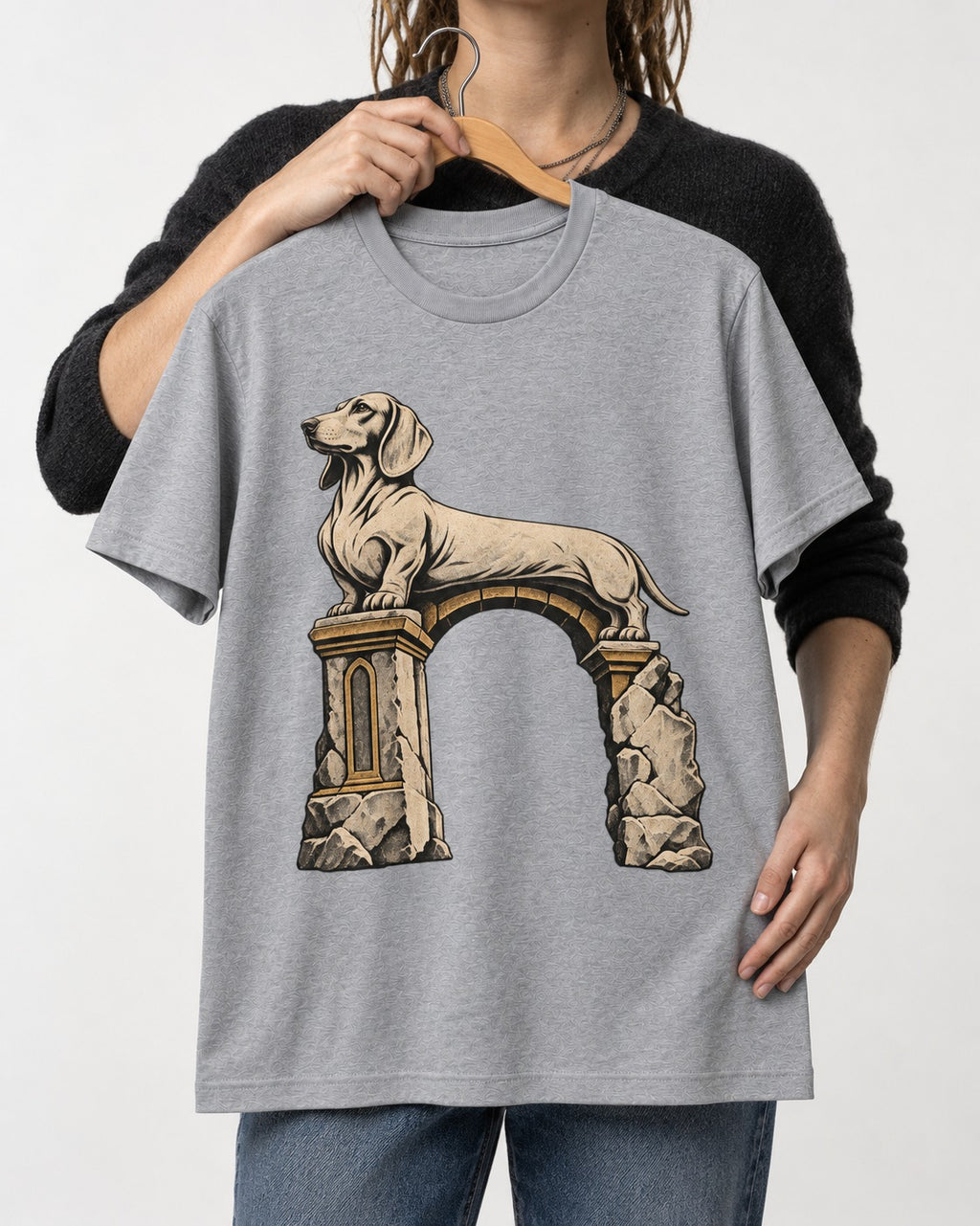 Dachshund Ruined Stone Arch Monument Graphic T-Shirt in Sport Grey, held up on a hanger
