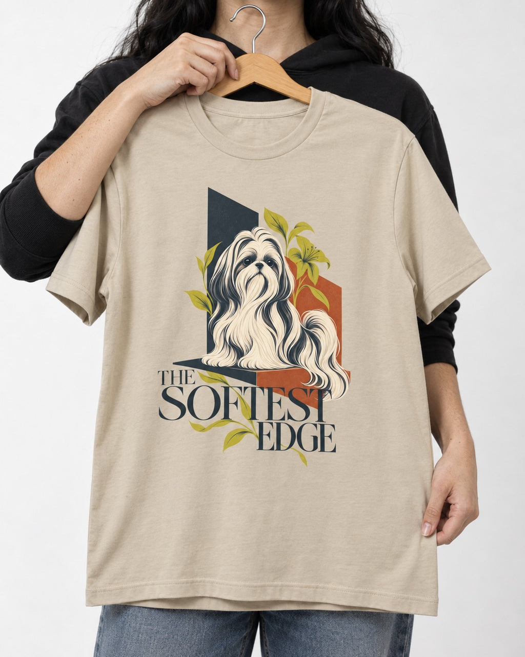 Shih Tzu The Softest Edge T-Shirt in Sand, held up on a hanger