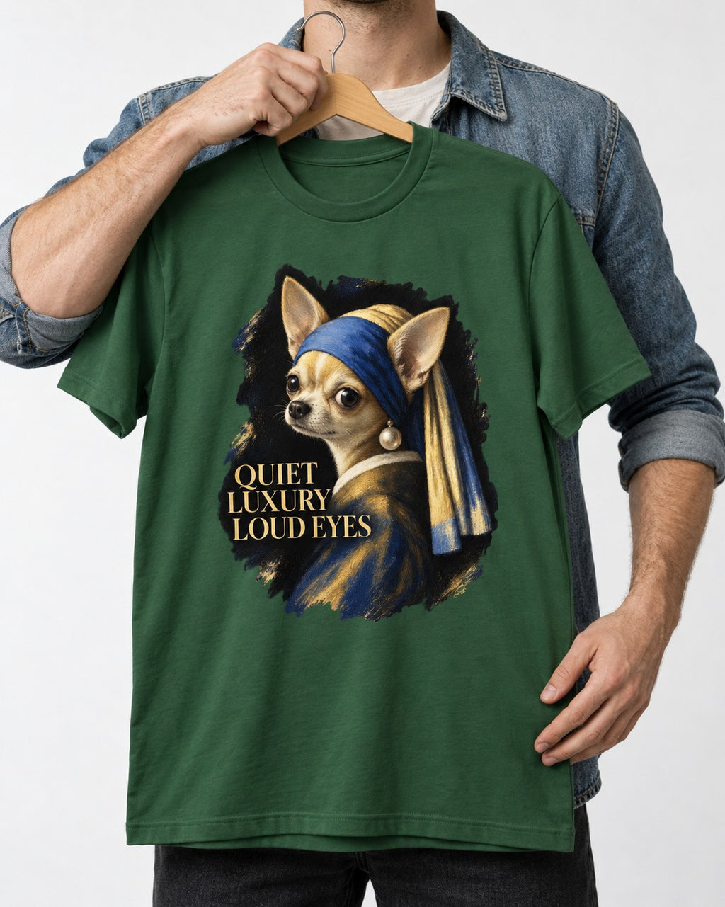 Chihuahua Quiet Luxury Loud Eyes Pearl Earring Portrait T-Shirt in Forest Green, held up on a hanger