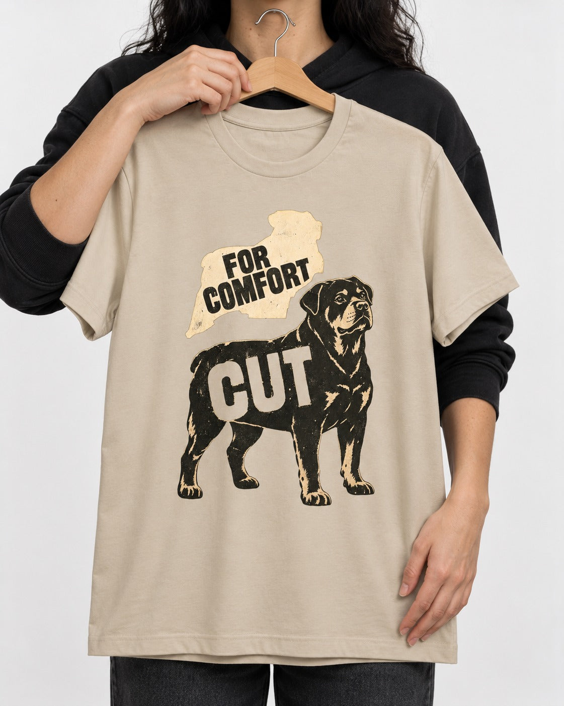Rottweiler Cut for Comfort T-Shirt in Sand, held up on a hanger