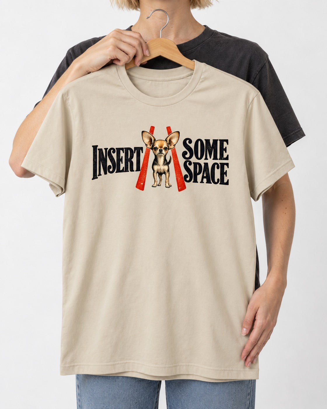 Insert Some Chihuahua Space T-Shirt in Sand, held up on a hanger