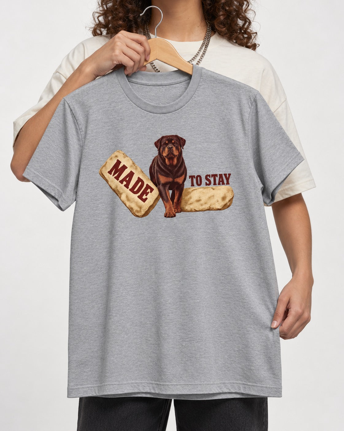 Rottweiler Made to Stay Stepping Stone Graphic T-Shirt in Sport Grey, held up on a hanger