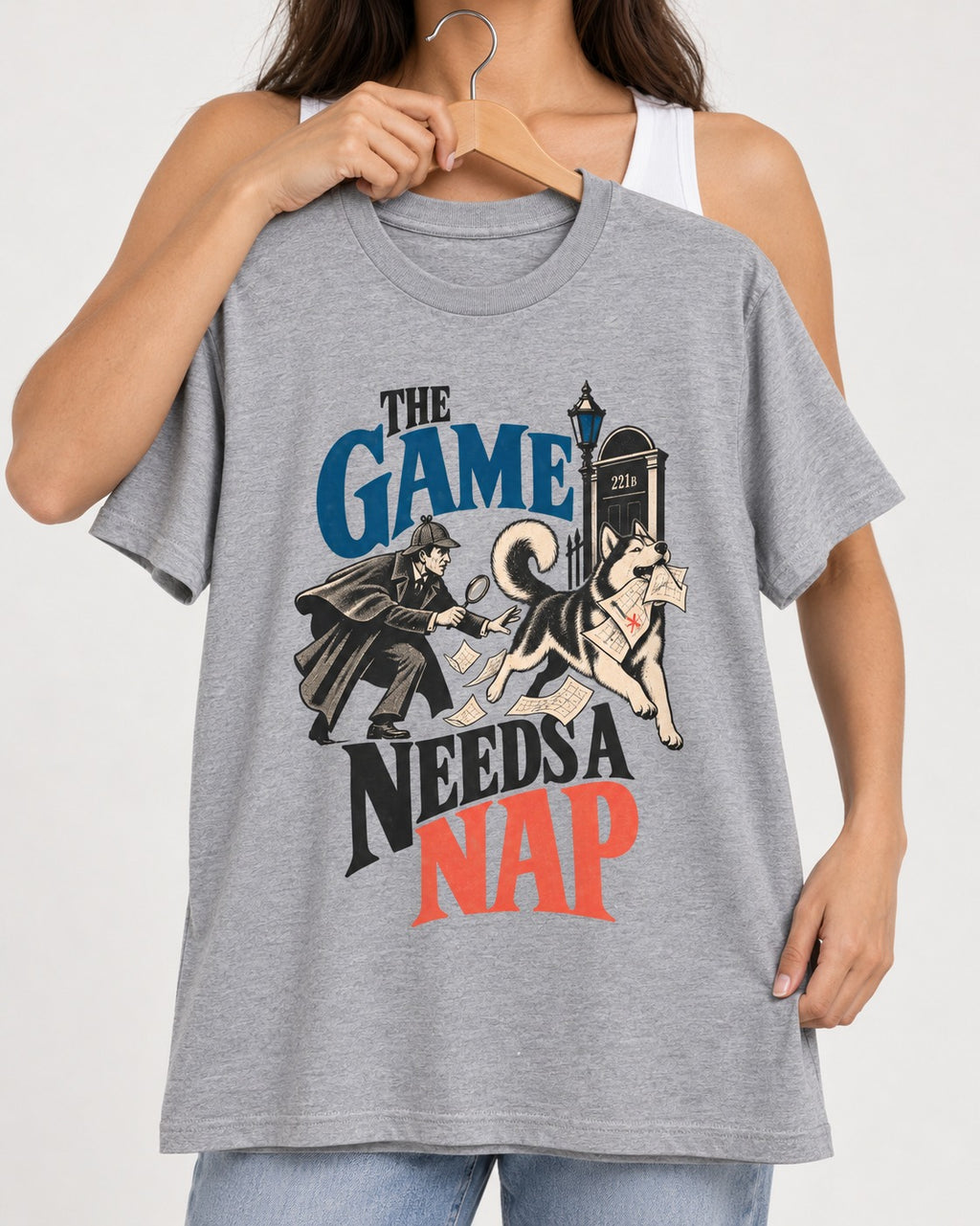 Husky Needs a Nap T-Shirt in Sport Grey, held up on a hanger