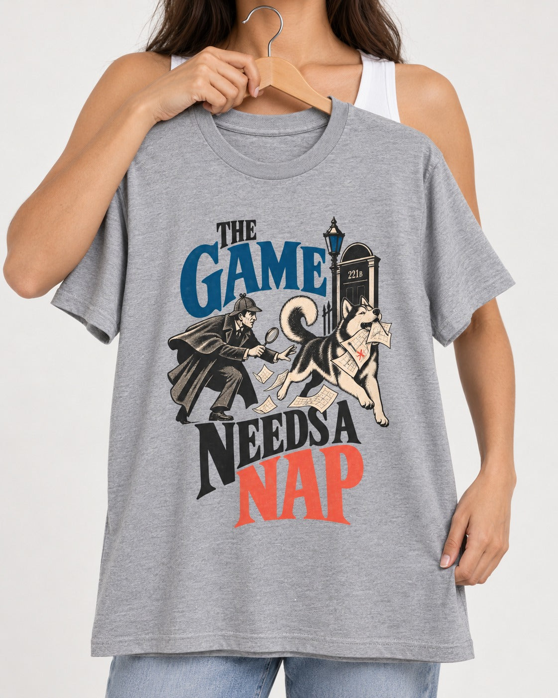 Husky Needs a Nap T-Shirt in Sport Grey, held up on a hanger