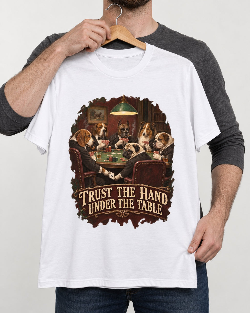 Pug Trust the Hand Under the Table Poker Graphic T-Shirt in White, held up on a hanger