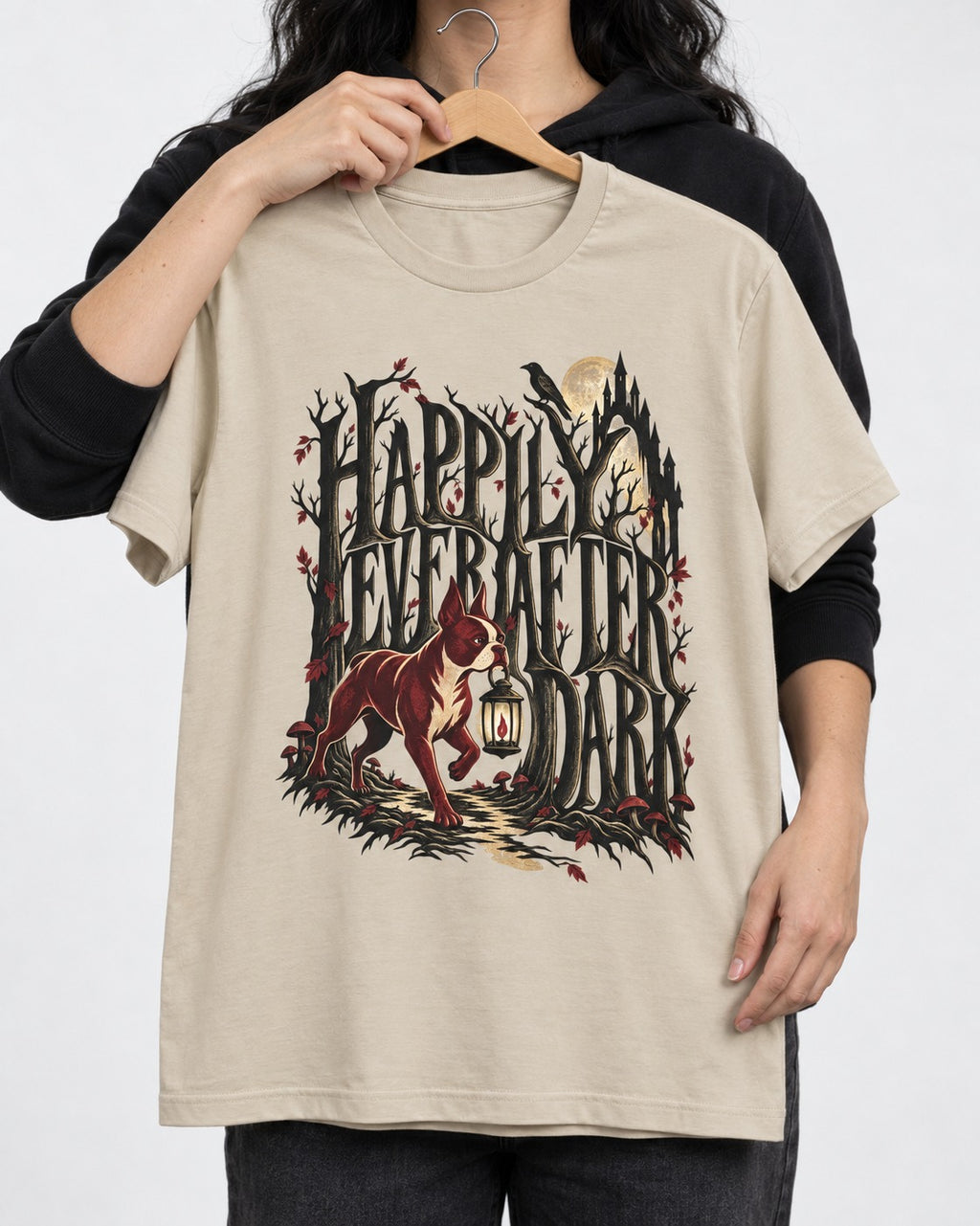Happily Ever After Dark Boston Terrier T-Shirt in Sand, held up on a hanger