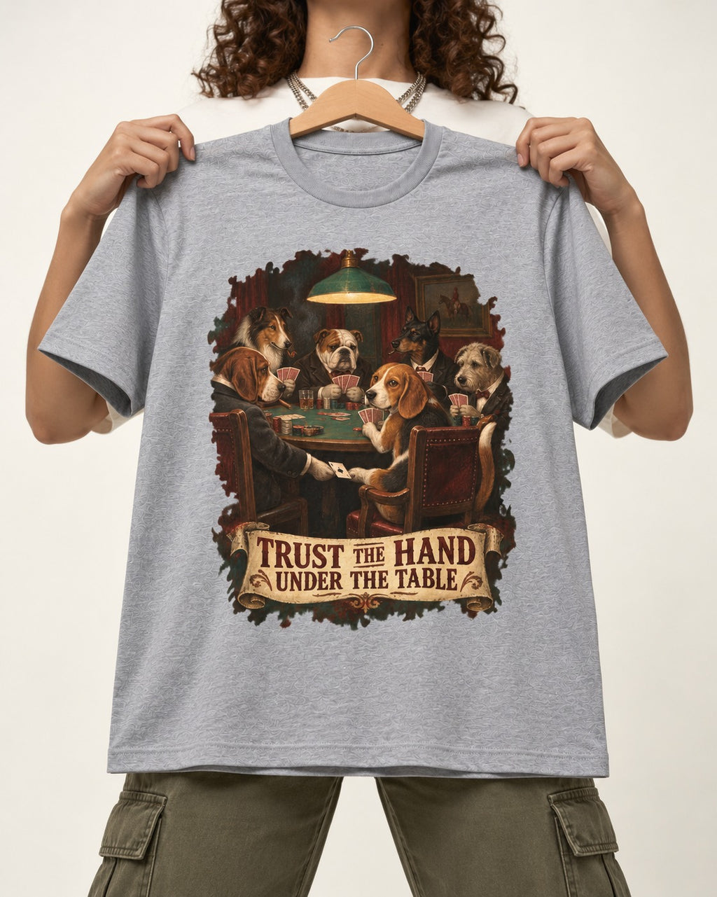 Trust The Hand Under The Table Beagle Poker Night T-Shirt in Sport Grey, held up on a hanger