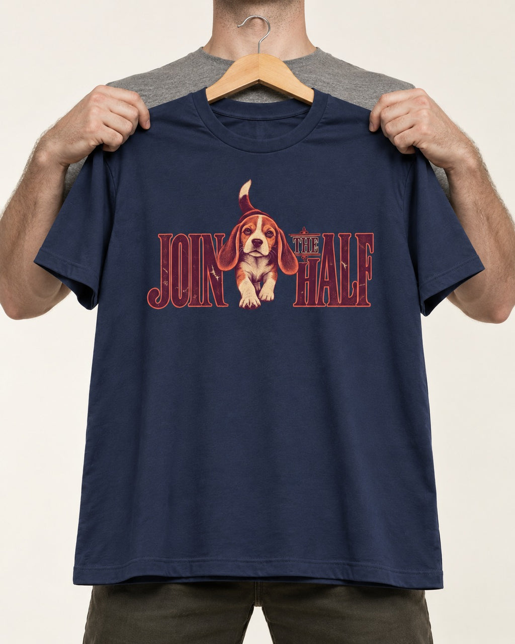 Beagle Join The Half T-Shirt in Navy, held up on a hanger