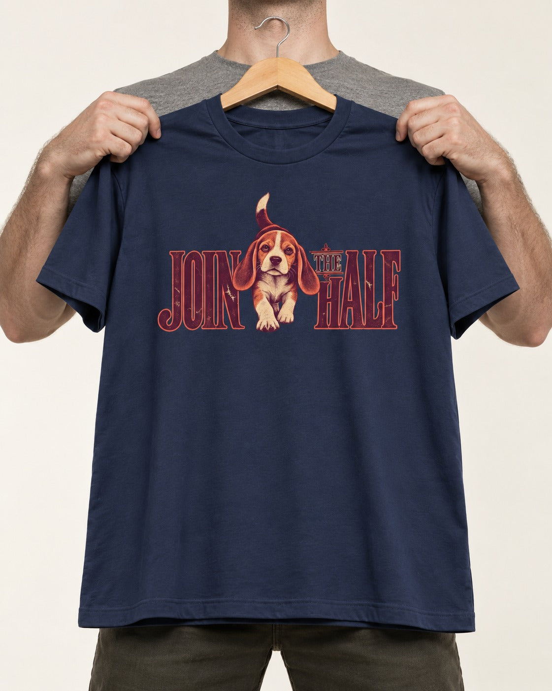 Beagle Join The Half T-Shirt in Navy, held up on a hanger