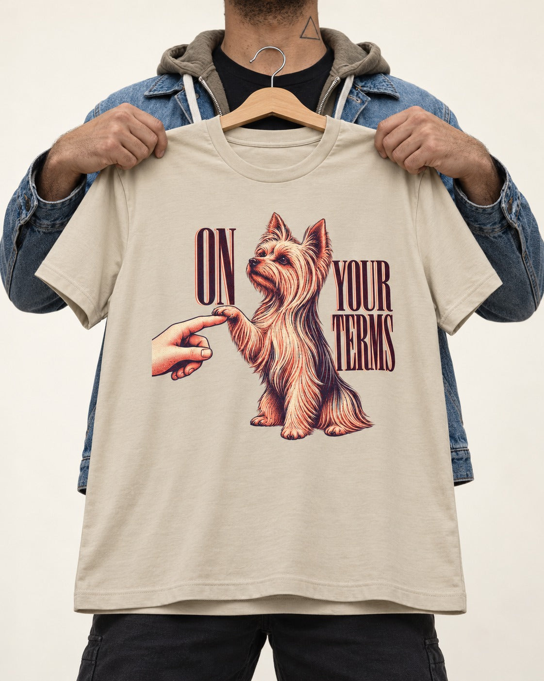 Yorkshire Terrier On Your Terms T-Shirt in Sand, held up on a hanger
