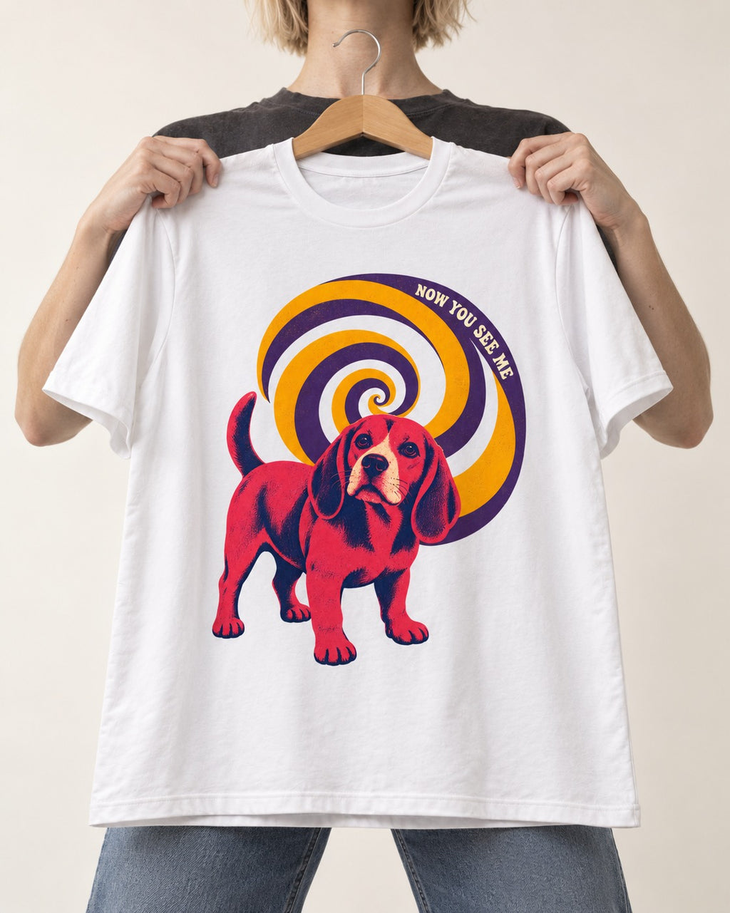 Now You See Me Beagle Spiral T-Shirt in White, held up on a hanger