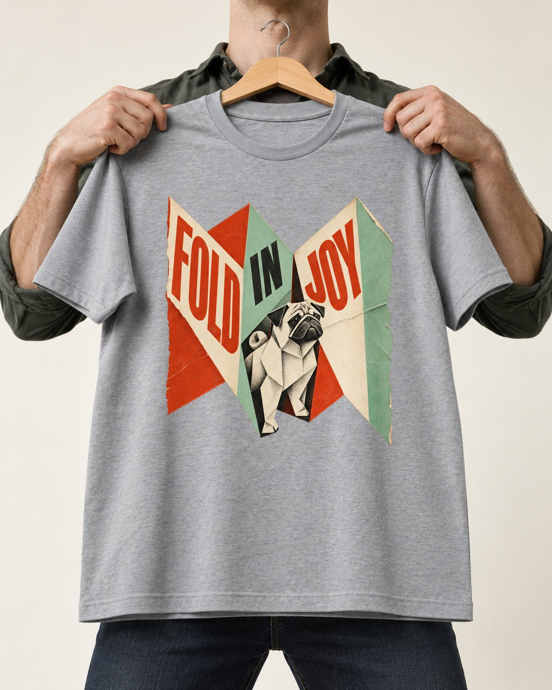 Pug Fold in Joy Geometric Poster Graphic T-Shirt in Sport Grey, held up on a hanger