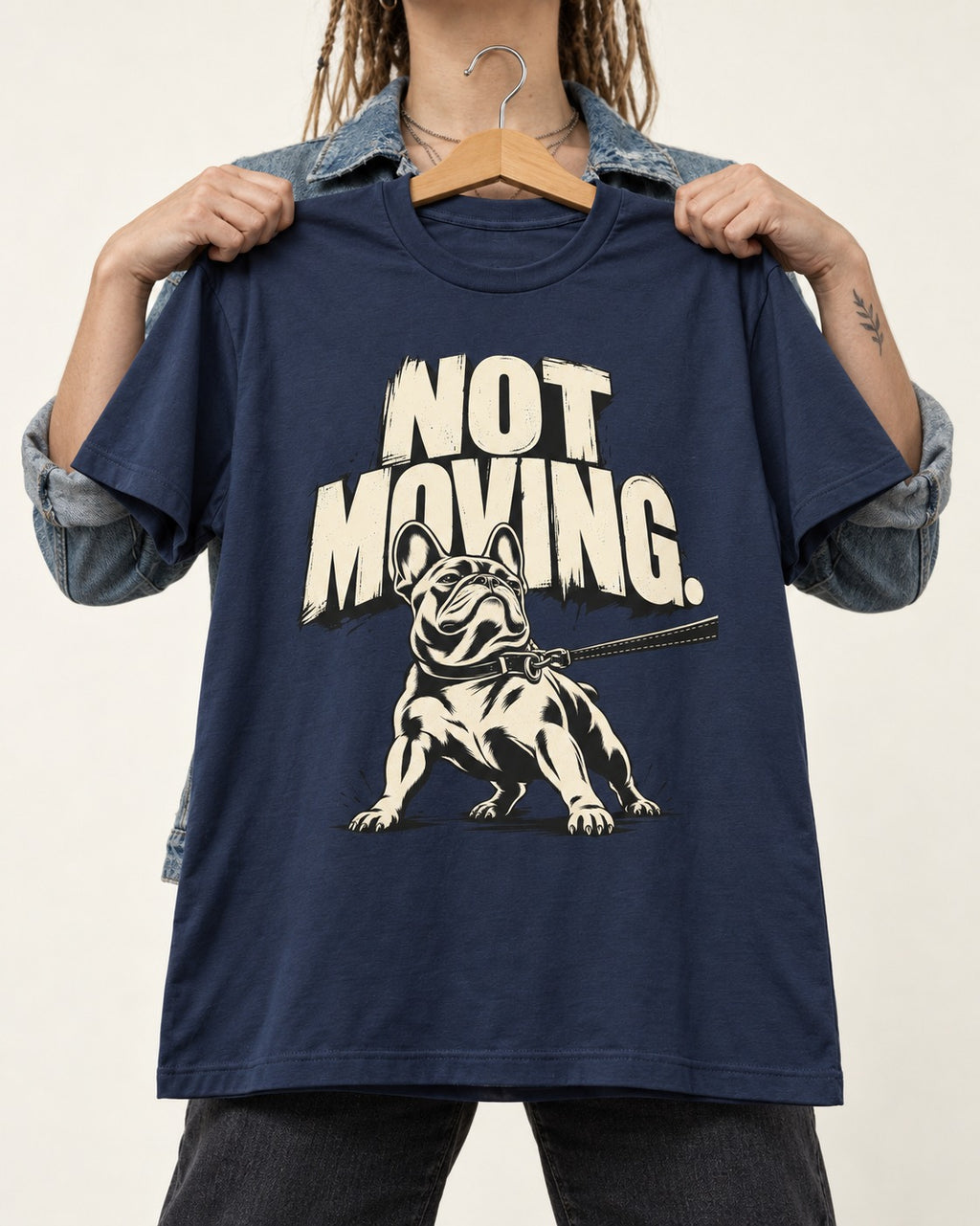 Frenchie Not Moving Taut Leash Poster T-Shirt in Navy, held up on a hanger