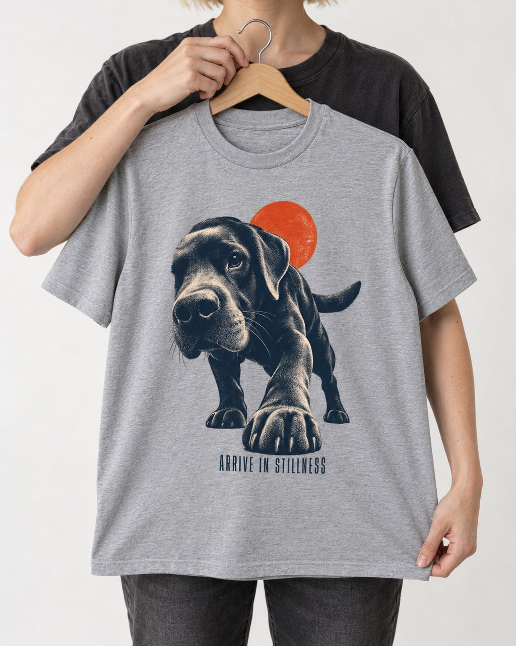 Labrador Retriever Arrive in Stillness T-Shirt in Sport Grey, held up on a hanger