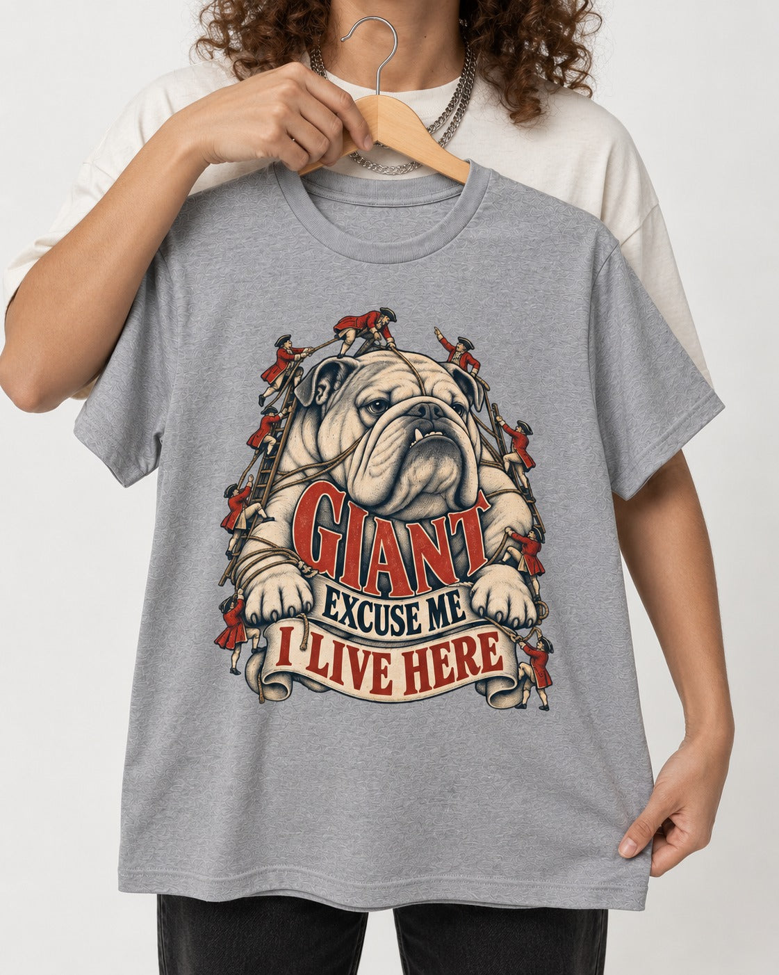 English Bulldog I Live Here T-Shirt in Sport Grey, held up on a hanger