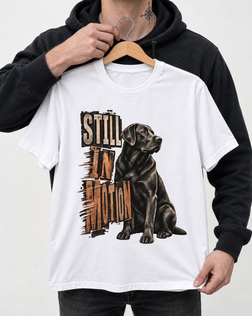 Labrador Retriever Still in Motion Seated Graphic T-Shirt in White, held up on a hanger