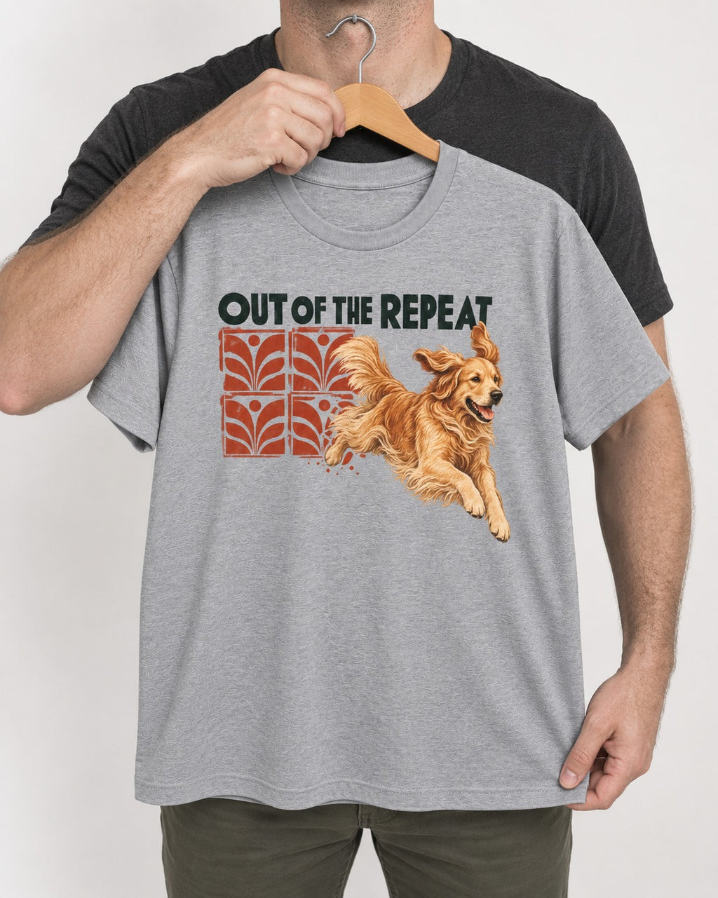 Golden Retriever Out of the Repeat T-Shirt in Sport Grey, held up on a hanger