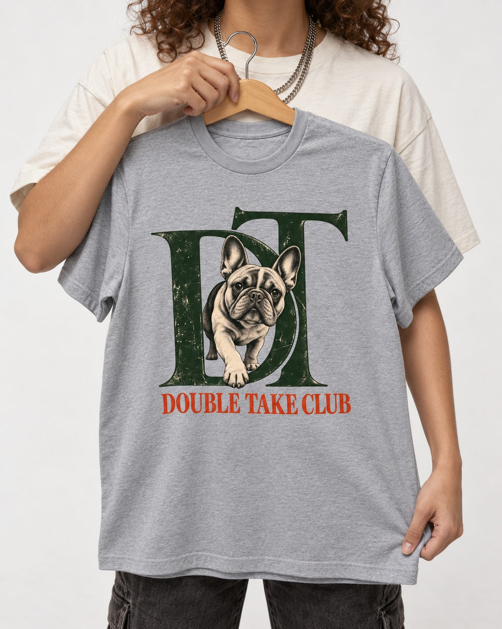 Frenchie Double Take Club T-Shirt in Sport Grey, held up on a hanger