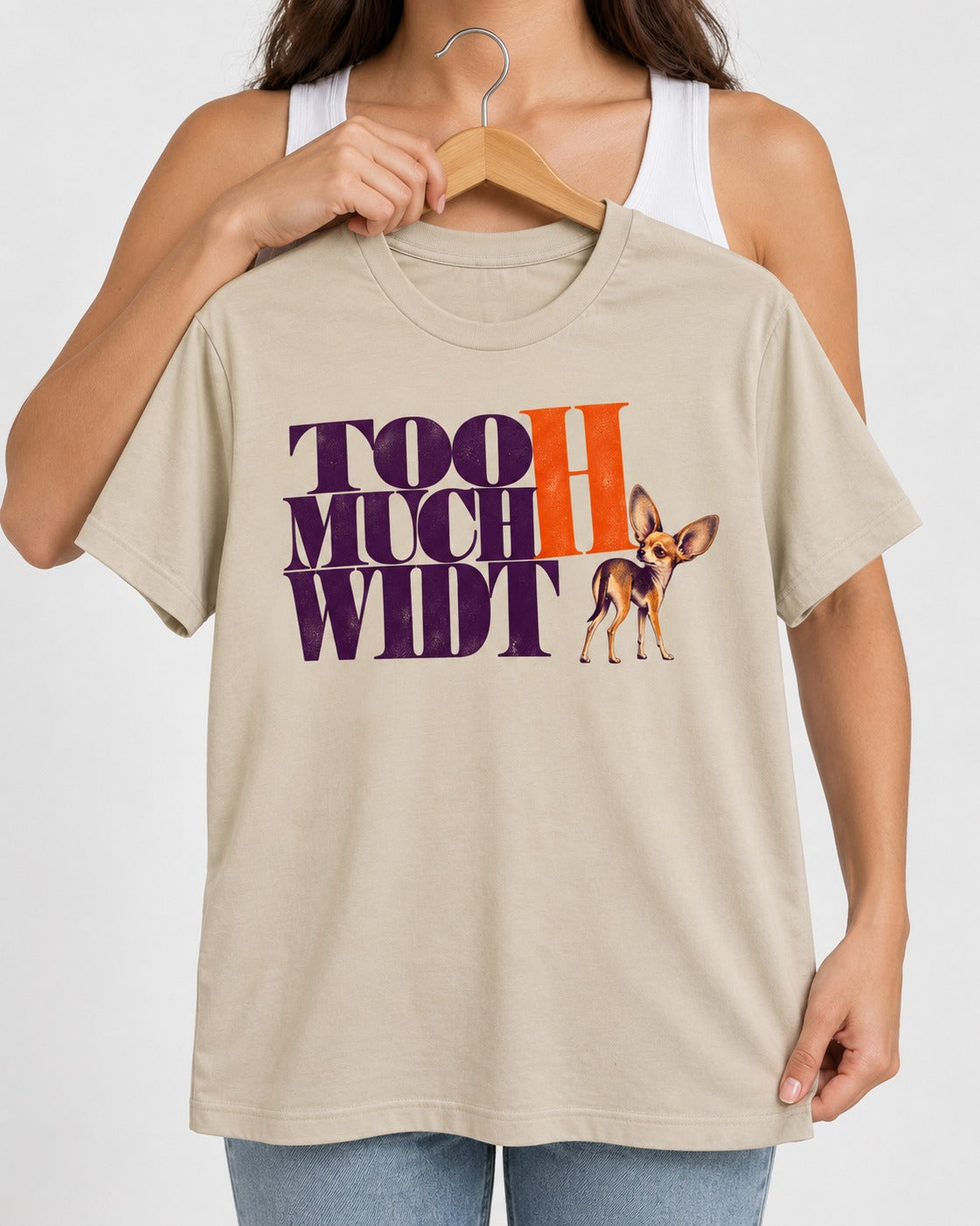 Too Much Width Chihuahua T-Shirt in Sand, held up on a hanger