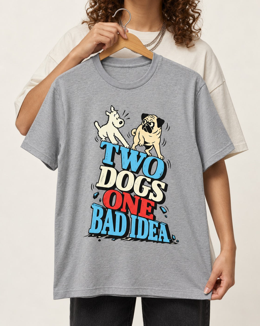 Pug Two Dogs One Bad Idea Graphic T-Shirt in Sport Grey, held up on a hanger