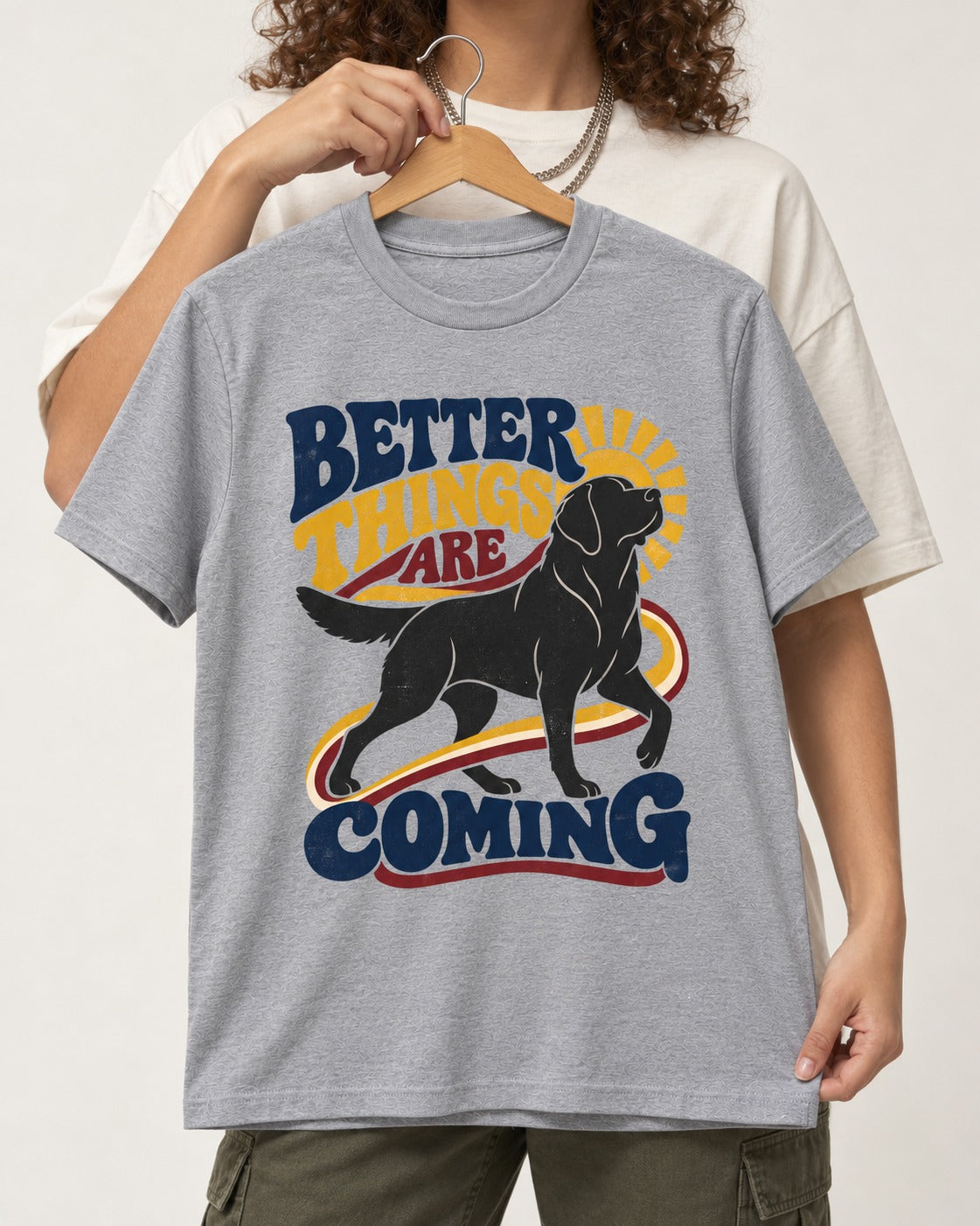 Better Things Are Coming Labrador Retriever T-Shirt in Sport Grey, held up on a hanger