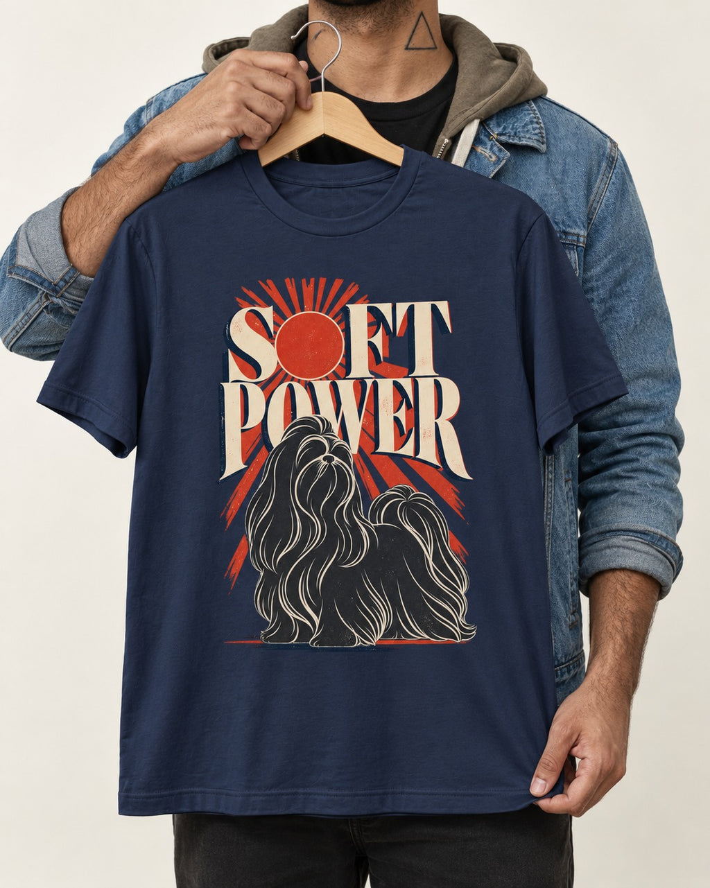 Shih Tzu Soft Power Sunburst Graphic T-Shirt in Navy, held up on a hanger