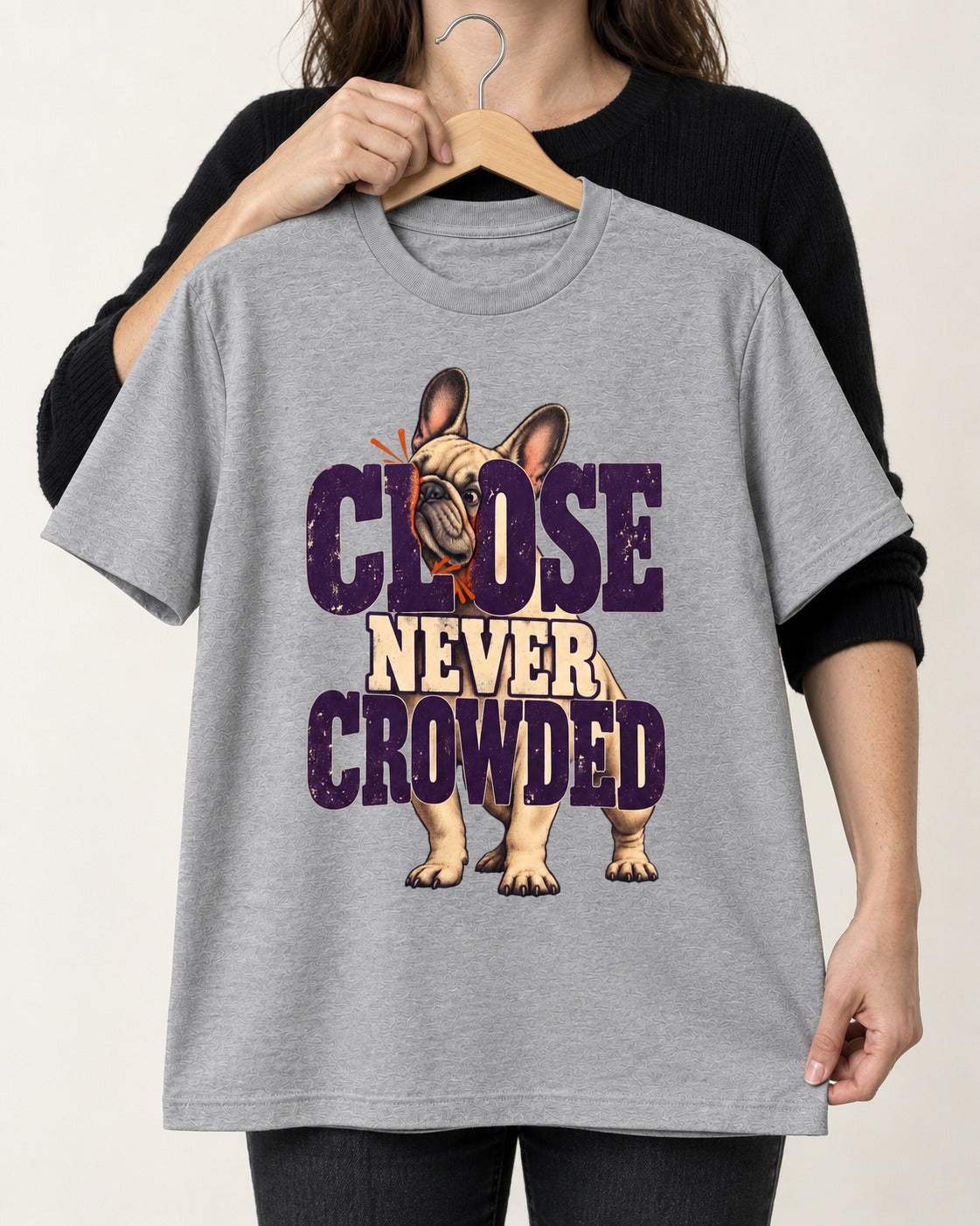 Frenchie Close Never Crowded Peekaboo Type Graphic T-Shirt in Sport Grey, held up on a hanger