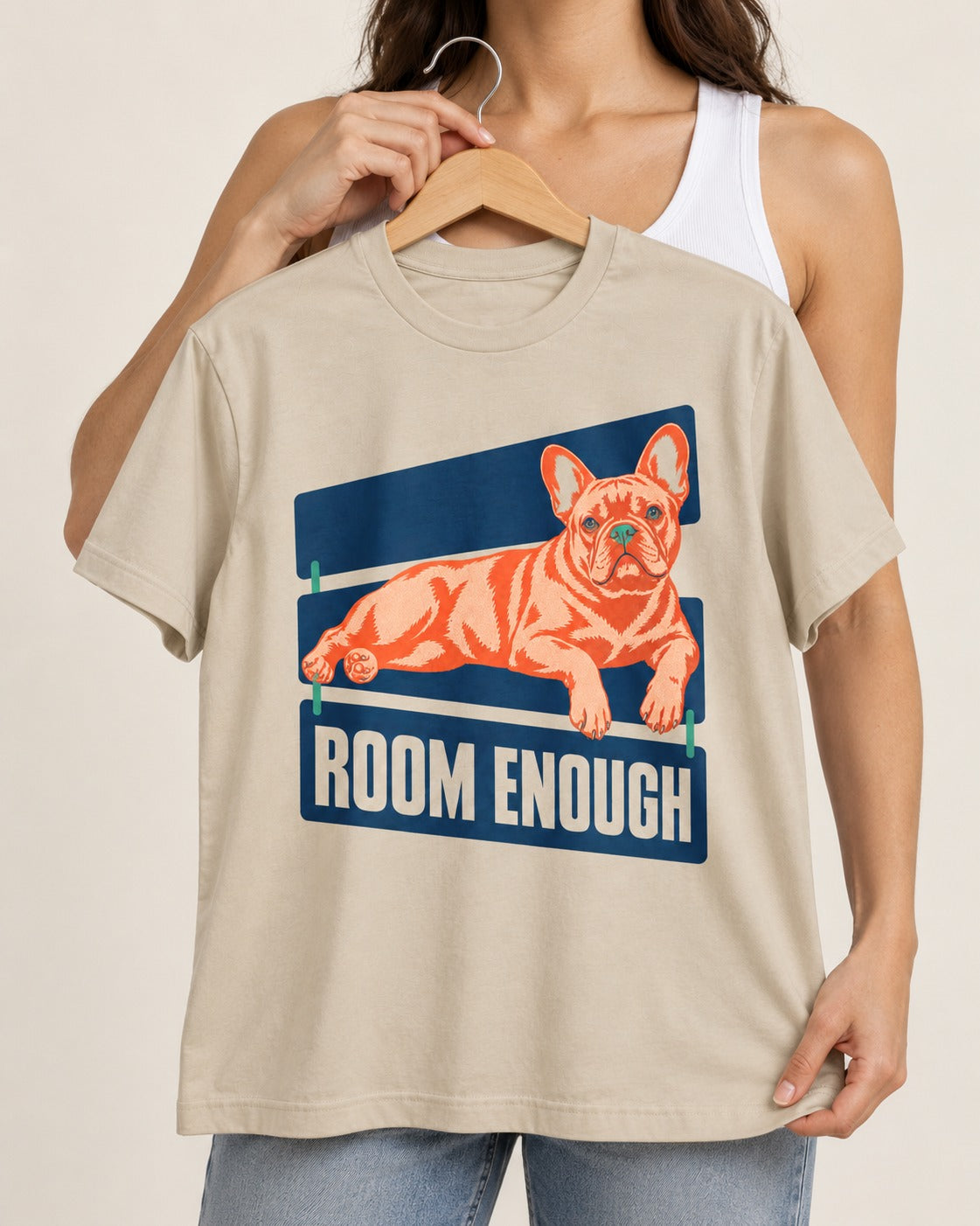 Room Enough for Frenchie T-Shirt in Sand, held up on a hanger