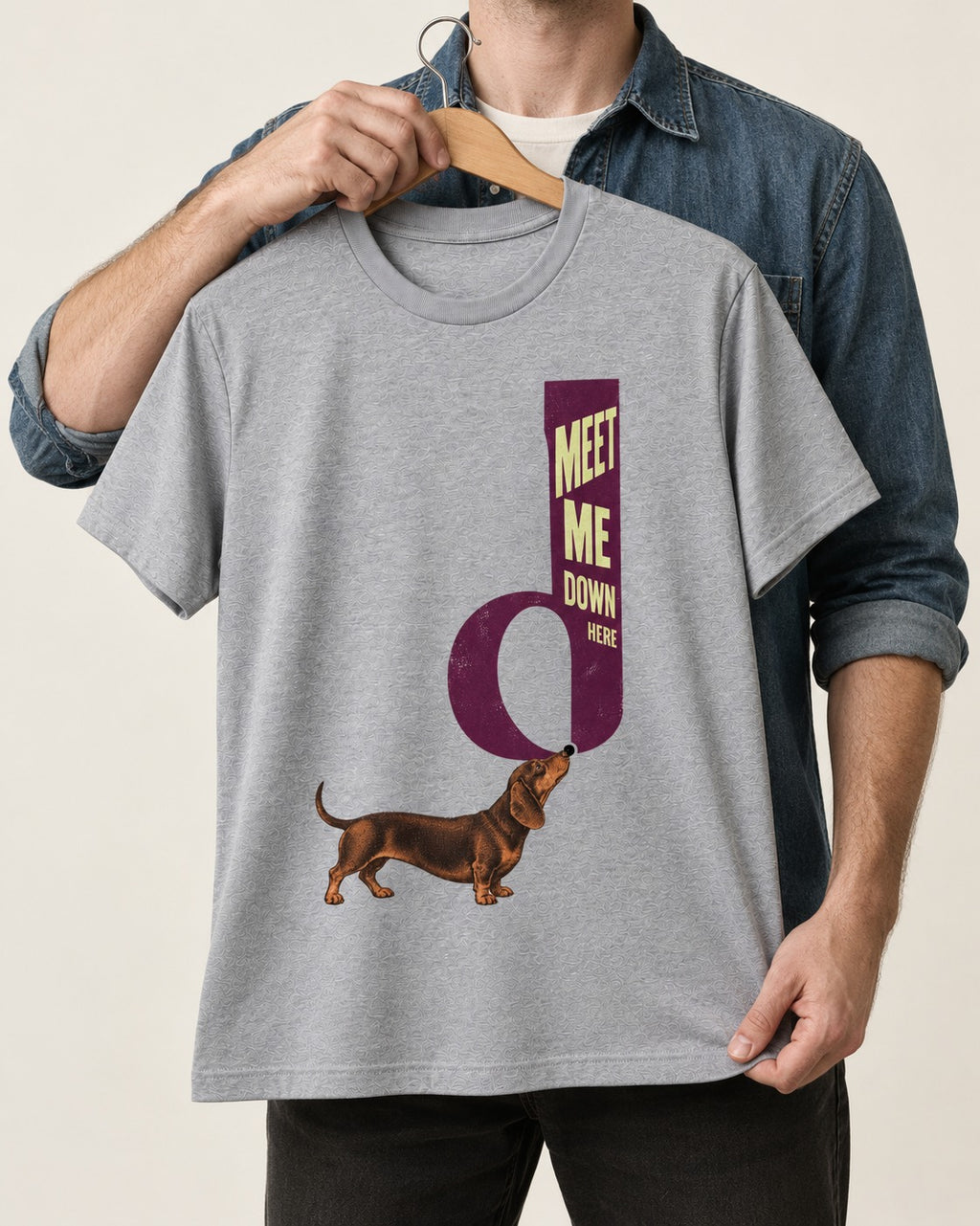 Dachshund Meet Me Down Here Letterform Loop Graphic T-Shirt in Sport Grey, held up on a hanger