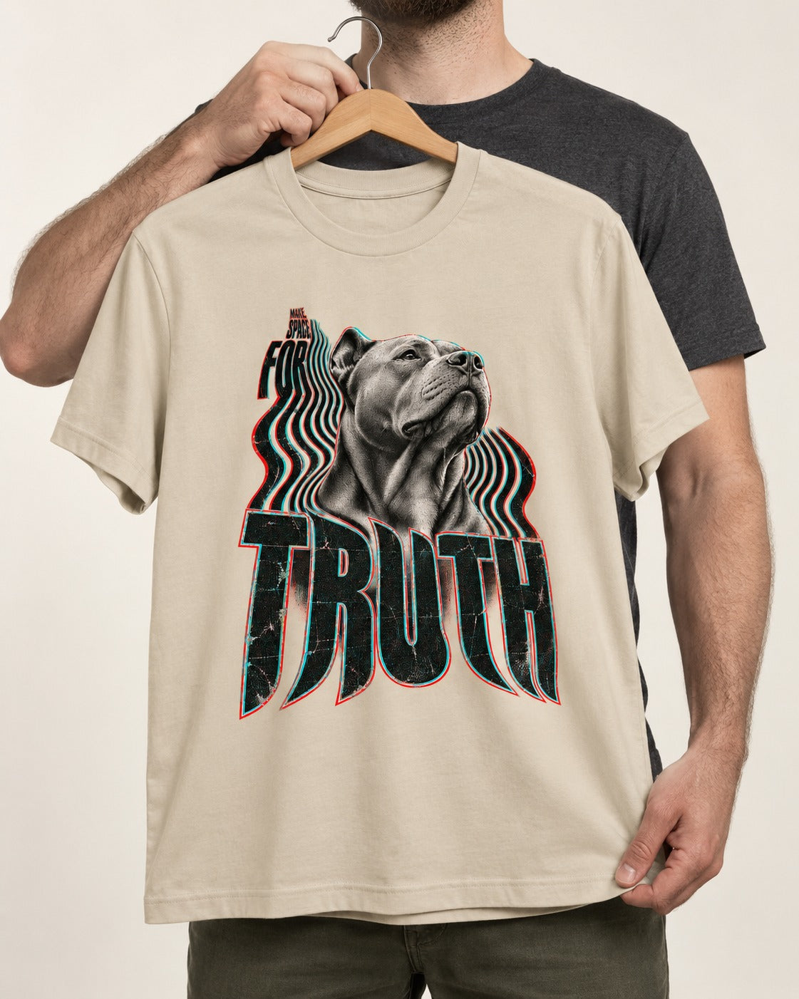 Pitbull Truth T-Shirt in Sand, held up on a hanger