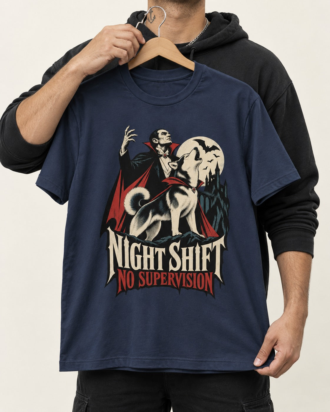 Husky Night Shift No Supervision Vampire Graphic T-Shirt in Navy, held up on a hanger