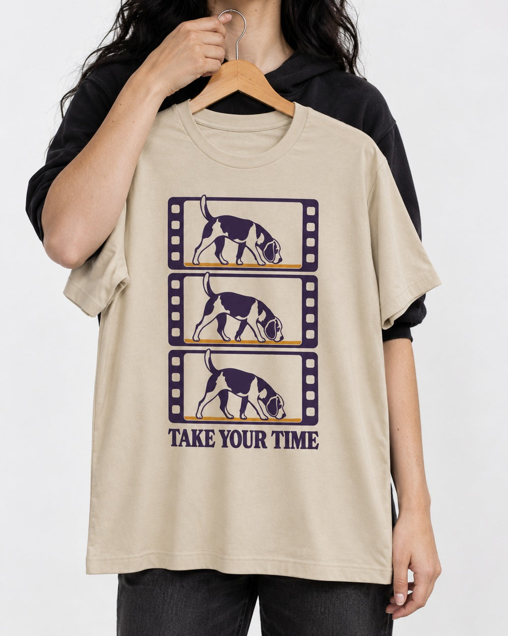 Beagle Take Your Time T-Shirt in Sand, held up on a hanger