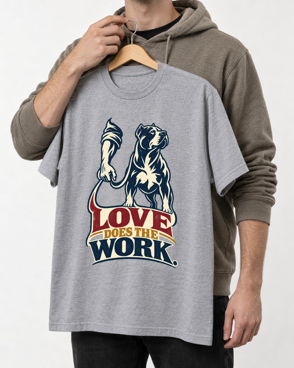 Pitbull Love Does the Work T-Shirt in Sport Grey, held up on a hanger